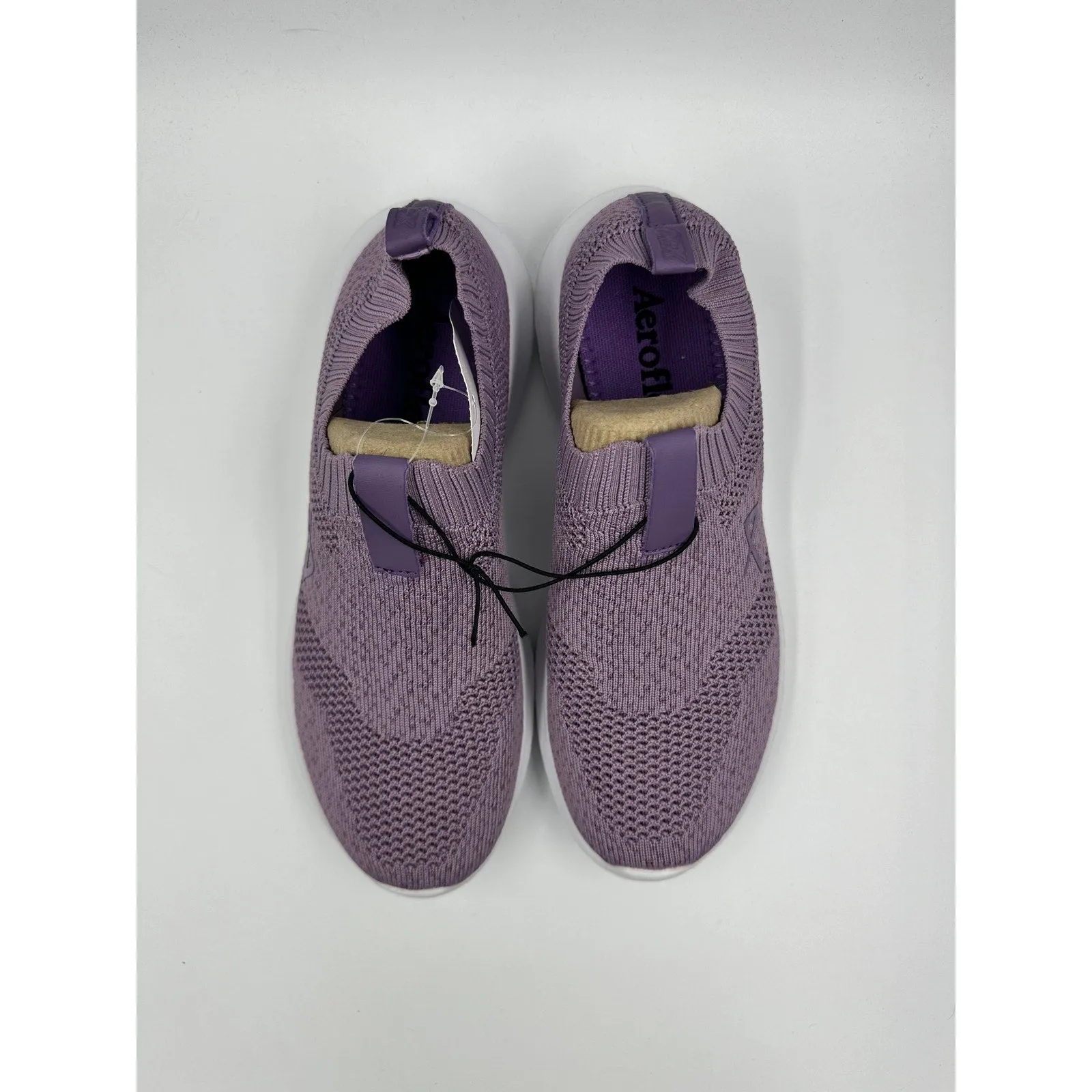 Women's Size 6.5, Light Purple Slip on Sneakers with a Knit Upper Sole